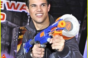 Taylor Lautner Toy Fair Nerf Blasters